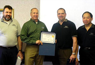 Glenn receives his certification from the Midwest training team.